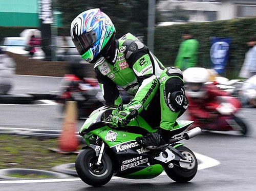Man on a small Bike