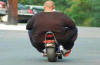 Fat Man on a Small Bike